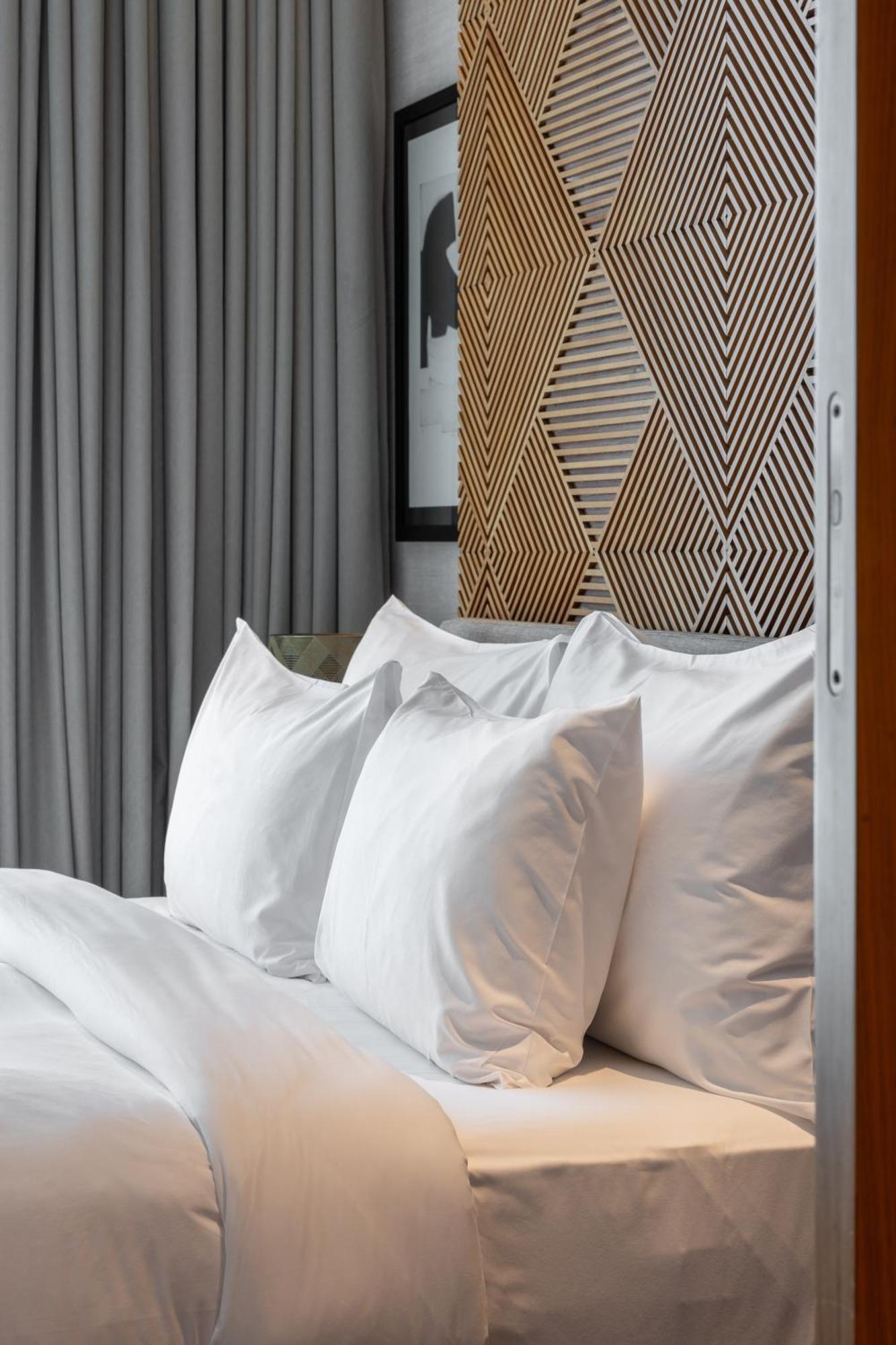 Shirvan Hotel City Yard Jeddah Exterior foto Pillows on a bed